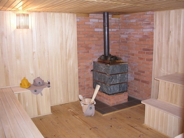 Правилно монтиране на печката в сауната на дървен под 3