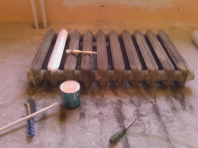 Процес на боядисване на радиатор за отопление